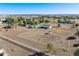 An aerial view of the property, highlighting its expansive grounds, buildings and surroundings at 12901 2Nd St, Parker, CO 80134