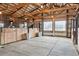 Spacious barn featuring stalls and ample natural light, providing a comfortable and functional space for animals at 12901 2Nd St, Parker, CO 80134