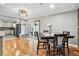Cozy dining area with hardwood floors, a view to the kitchen, and natural light at 12901 2Nd St, Parker, CO 80134