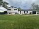 Charming home with a large, well-maintained front yard and decorative fountain at 12901 2Nd St, Parker, CO 80134