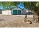Exterior shot of a functional outbuilding, featuring dual doors and ample space for storage or projects at 12901 2Nd St, Parker, CO 80134