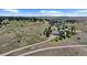 Aerial view of house and large lot with surrounding landscape at 9696 E Sand Lily Ln, Parker, CO 80134