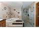 Bathroom features a corner soaking tub and a walk-in shower at 9696 E Sand Lily Ln, Parker, CO 80134