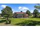Two-story home with large windows and a spacious backyard at 9696 E Sand Lily Ln, Parker, CO 80134