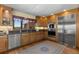 Modern kitchen features stainless steel appliances and ample cabinetry at 9696 E Sand Lily Ln, Parker, CO 80134