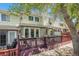 Inviting back deck with red railing provides a relaxing outdoor space at 5252 W 68Th Ave, Arvada, CO 80003
