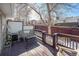Backyard deck provides a secluded space with comfortable seating and a privacy fence at 5252 W 68Th Ave, Arvada, CO 80003