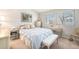 Comfortable bedroom with natural light, neutral colors, and a well-coordinated decor at 5252 W 68Th Ave, Arvada, CO 80003