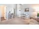 Inviting office space featuring neutral walls, a cozy floral sofa, and a classic desk at 5252 W 68Th Ave, Arvada, CO 80003