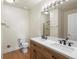 Bathroom with double vanity, updated fixtures and shower at 6000 W Floyd Ave # 105, Denver, CO 80227