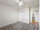 Bedroom with double closet and access to bathroom at 6000 W Floyd Ave # 105, Denver, CO 80227