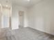 Spacious bedroom with neutral carpeting and double closets at 6000 W Floyd Ave # 105, Denver, CO 80227