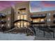 Building exterior showcasing modern design and landscaping at 6000 W Floyd Ave # 105, Denver, CO 80227