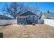 Enjoy this fenced backyard with a patio, fire pit, and lovely stone pathway at 1560 Clinton St, Aurora, CO 80010