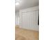 Bedroom featuring carpet, closet, neutral colors, and a simple design at 1560 Clinton St, Aurora, CO 80010