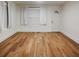 Bright and airy living room with hardwood floors, ready for your personal touch and decor at 1560 Clinton St, Aurora, CO 80010