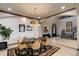 Elegant dining room featuring modern decor, stylish lighting, and comfortable seating at 28154 Belle Mont Trl, Conifer, CO 80433