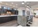 Stylish kitchen with a large island, stainless steel appliances, custom cabinets, and hardwood floors at 28154 Belle Mont Trl, Conifer, CO 80433