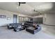 Spacious living room with vaulted ceilings, modern decor, and cozy seating areas at 28154 Belle Mont Trl, Conifer, CO 80433