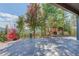 Spacious outdoor patio with stunning mountain views and shade at 28154 Belle Mont Trl, Conifer, CO 80433