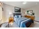 Bright bedroom with neutral walls, carpeted flooring, and an art piece on the wall at 278 Snowshoe Cir, Breckenridge, CO 80424