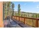 Relax on this spacious deck, complete with metal furniture, to take in the stunning views at 278 Snowshoe Cir, Breckenridge, CO 80424