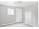 Minimalist bedroom with light gray walls, carpeted flooring, and a single window at 4821 W 102Nd Ave, Westminster, CO 80031
