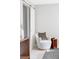 Comfortable room showcasing a cozy chair, minimalist decor, and a barn door at 4821 W 102Nd Ave, Westminster, CO 80031