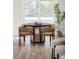Bright breakfast nook features a round table with seating for four and natural light at 4821 W 102Nd Ave, Westminster, CO 80031