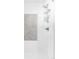 Modern shower features a shower head, chrome fixtures and tiled walls with gray stone accent at 4821 W 102Nd Ave, Westminster, CO 80031