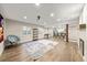 Spacious finished basement with a large area rug at 2757 Stallion Way, Mead, CO 80542