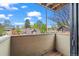 Balcony with a beautiful view of the surrounding neighborhood and trees at 3050 W 32Nd Ave # 104C, Denver, CO 80211