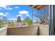 Inviting balcony view with charming neighborhood scenery and bright blue sky in a desirable location at 3050 W 32Nd Ave # 104C, Denver, CO 80211