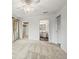 Well-lit bedroom leads to walk-in closet and en-suite bathroom at 3050 W 32Nd Ave # 104C, Denver, CO 80211