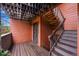 Close up of building entrance with stairs, porch and door at 3050 W 32Nd Ave # 104C, Denver, CO 80211