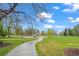 Scenic park with a playground and winding paved pathway at 3050 W 32Nd Ave # 104C, Denver, CO 80211