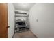 Storage room with metal shelves and a concrete floor at 3050 W 32Nd Ave # 104C, Denver, CO 80211
