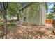 Spacious backyard featuring a patio and mature tree coverage for pleasant outdoor living at 4267 W Kenyon Ave, Denver, CO 80236
