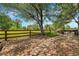 Backyard featuring a flagstone path, greenery, and view of the surrounding area at 4267 W Kenyon Ave, Denver, CO 80236