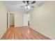 Bedroom with wood floors and walk-in closet, offering a comfortable living space at 4267 W Kenyon Ave, Denver, CO 80236