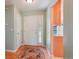 Inviting foyer features hardwood floors and a decorative front door with stained glass window at 5740 S Tempe Ct, Aurora, CO 80015