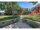 Attractive brick building with a landscaped front yard at 3233 Vallejo St # 3B, Denver, CO 80211