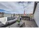 Relaxing rooftop patio featuring stylish seating and great views at 1751 Peak Loop, Broomfield, CO 80023