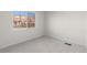 Bedroom features a new window, carpet and access to outlets at 4910 Alcott St, Denver, CO 80221