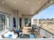 Cozy covered deck with outdoor seating area and grilling area; perfect for entertaining and outdoor living at 22773 E Narrowleaf Cir, Aurora, CO 80016