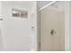 Clean bathroom featuring a glass shower, vanity, and a small window for light at 1327 E 108Th Pl, Northglenn, CO 80233