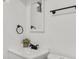 Clean bathroom featuring a vanity, mirror, and modern black fixtures at 1327 E 108Th Pl, Northglenn, CO 80233