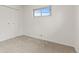 Bedroom features a white closet and an eye-level window at 1327 E 108Th Pl, Northglenn, CO 80233