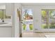 Bright entryway with white walls, modern finishes and front yard view at 1327 E 108Th Pl, Northglenn, CO 80233