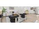 Chic living room with modern furniture and an open layout, perfect for entertaining at 1327 E 108Th Pl, Northglenn, CO 80233